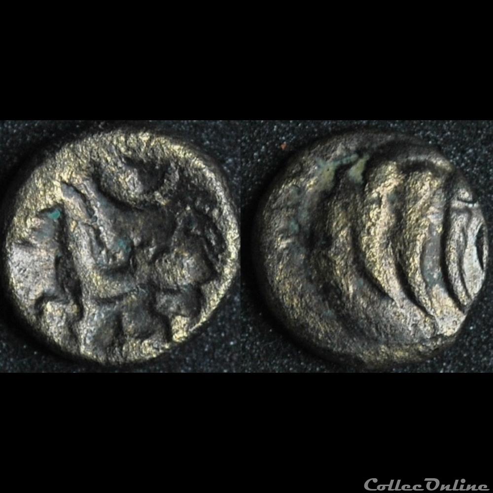 quart de statère dit "aux arcs de cercle" à la griffe " " aux segments " monnaie antique gauloise quart de statere dit aux arcs de cercle a la griffe aux segments
