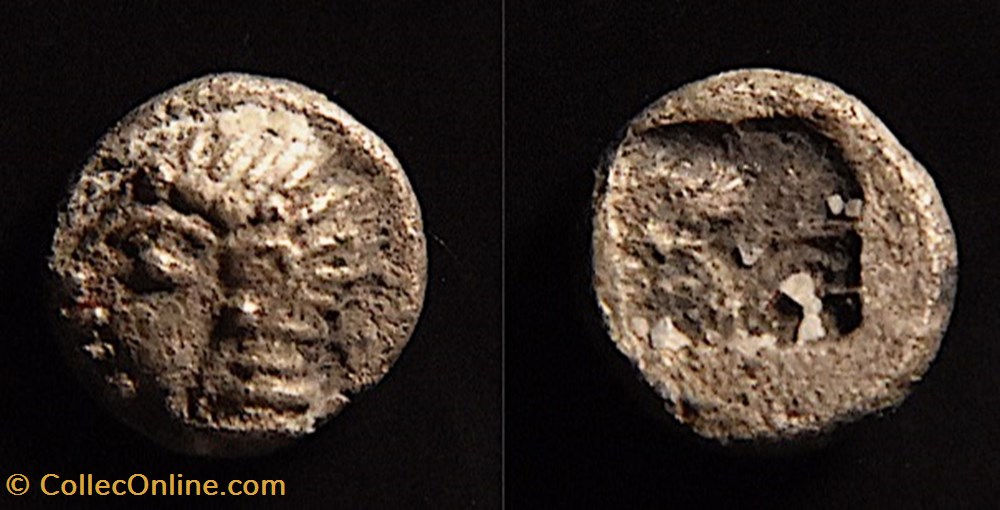 Ionie, Kolophon, VIe siècle av.jc. (AR) Tétartémorion à la tête archaïque monnaies antiques grecques ionie kolophon vie siecle av jc ar tetartemorion a la tete archaique
