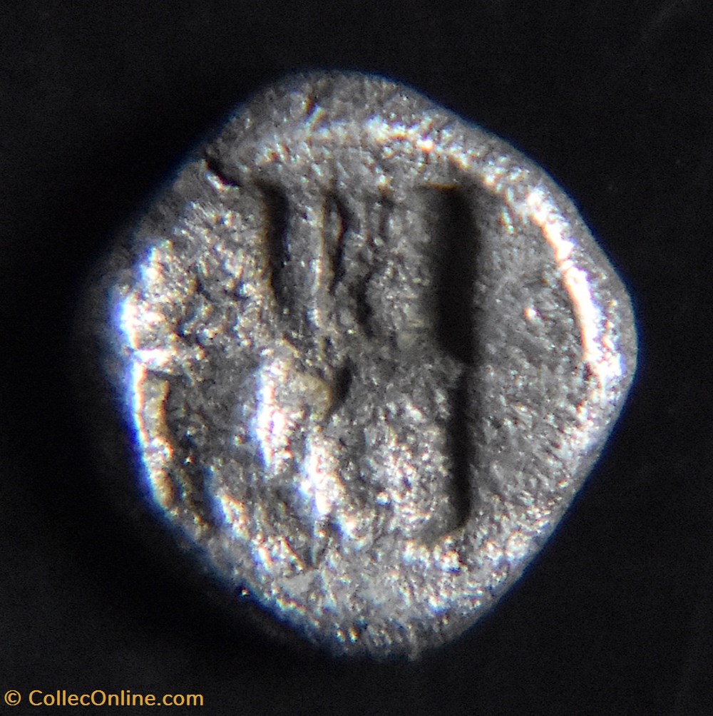 Ionie, Kolophon, VIe siècle av.jc. (AR) Tétartémorion à la tête archaïque monnaies antiques grecques ionie kolophon vie siecle av jc ar tetartemorion a la tete archaique