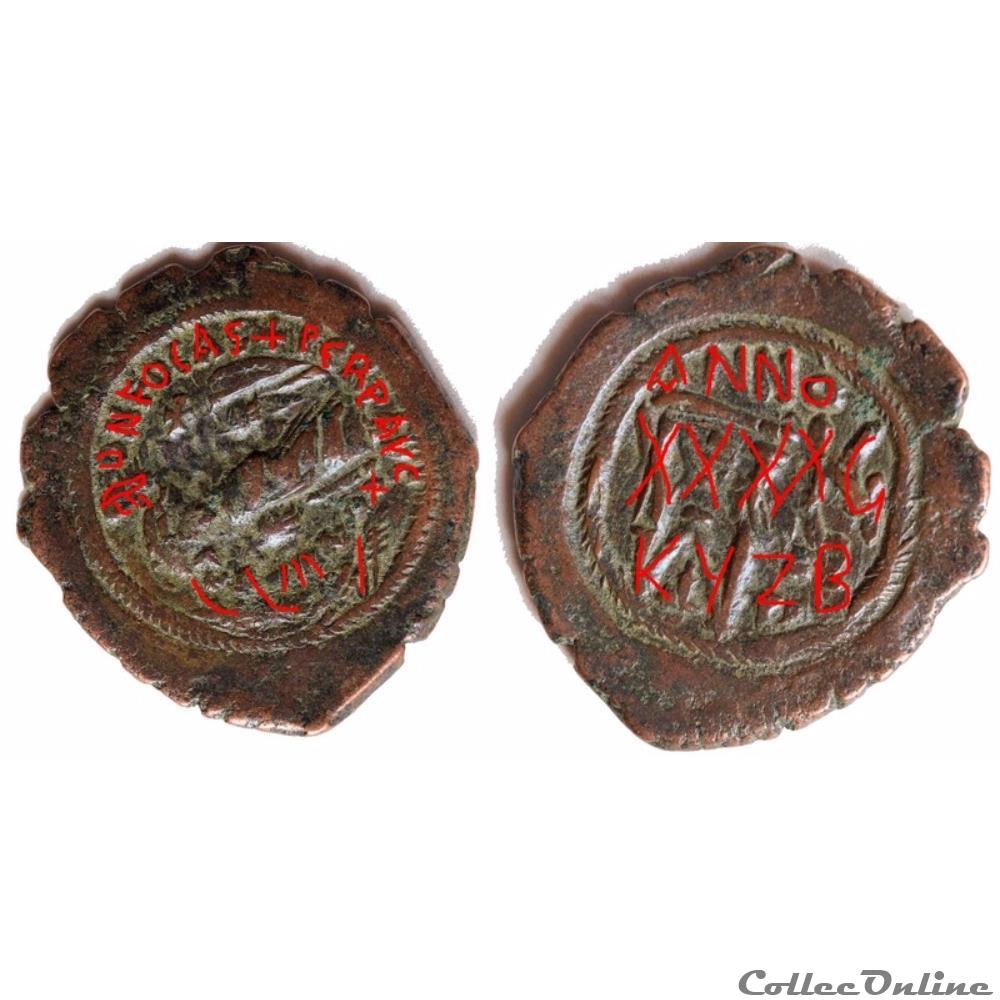 HERACLIUS et CONSTANTIN (636 - 637) Follis Constantinople - Surfrappée sur un Follis de Phocas 3 monnaie antique byzantine heraclius et constantin 636 637 follis constantinople surfrappee sur un follis de phocas