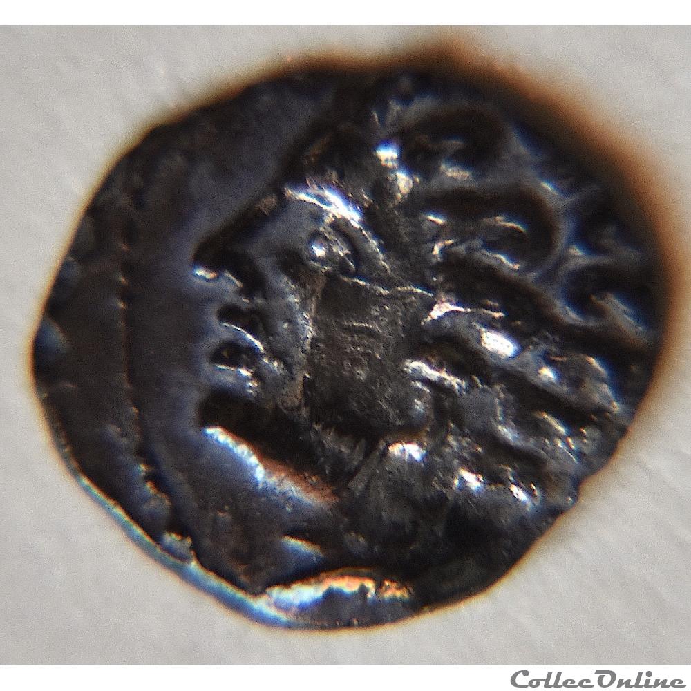 monnaie antique gauloise obole nemausus de 120 a 49 av j c tete juvenile a gauche m a bouletees