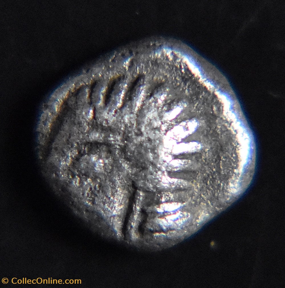 Ionie, Kolophon, VIe siècle av.jc. (AR) Tétartémorion à la tête archaïque monnaies antiques grecques ionie kolophon vie siecle av jc ar tetartemorion a la tete archaique
