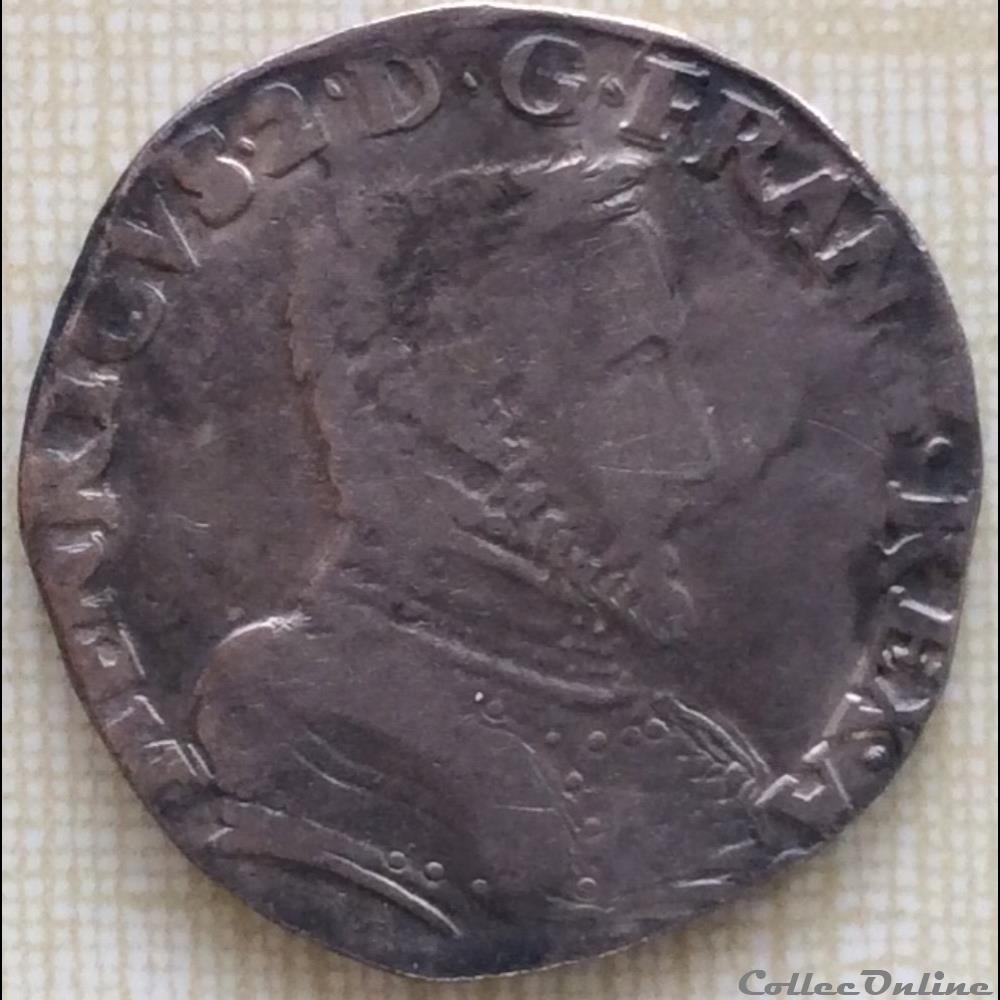 Teston à la tête nue et H couronnés Henri II 1554 D Lyon monnaies france royales teston a la tete nue et h couronnes henri ii 1554 d lyon