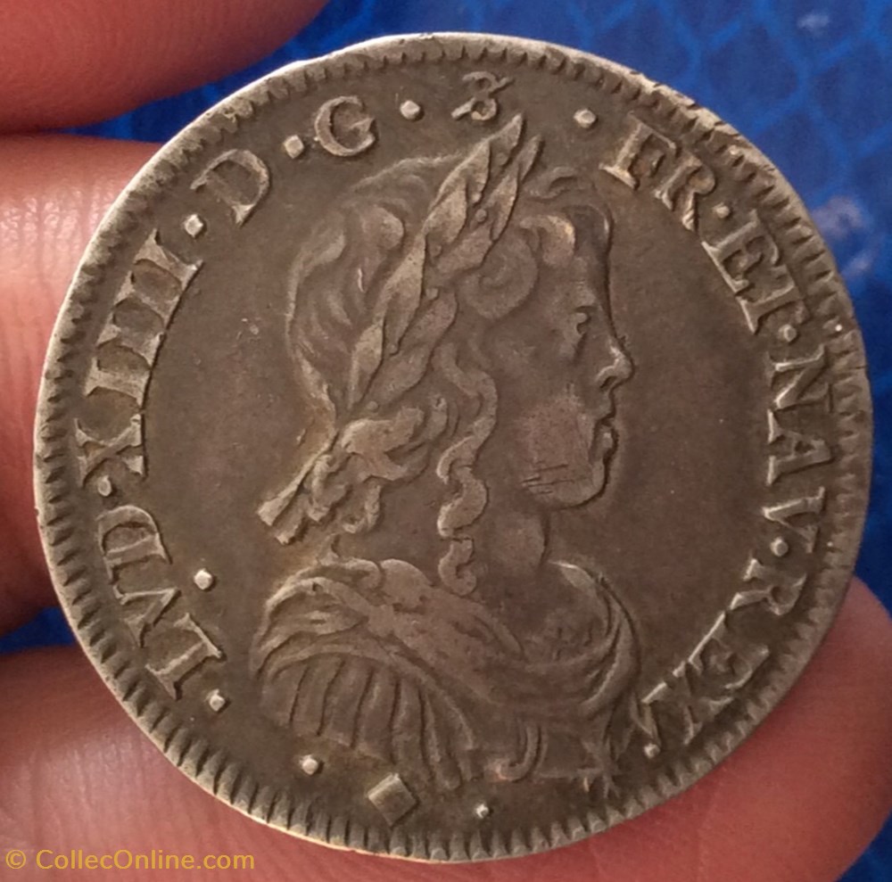Quart d’écu à la mèche longue Louis XIV 1653 D Lyon monnaies france royales quart d ecu a la meche longue louis xiv 1653 d lyon