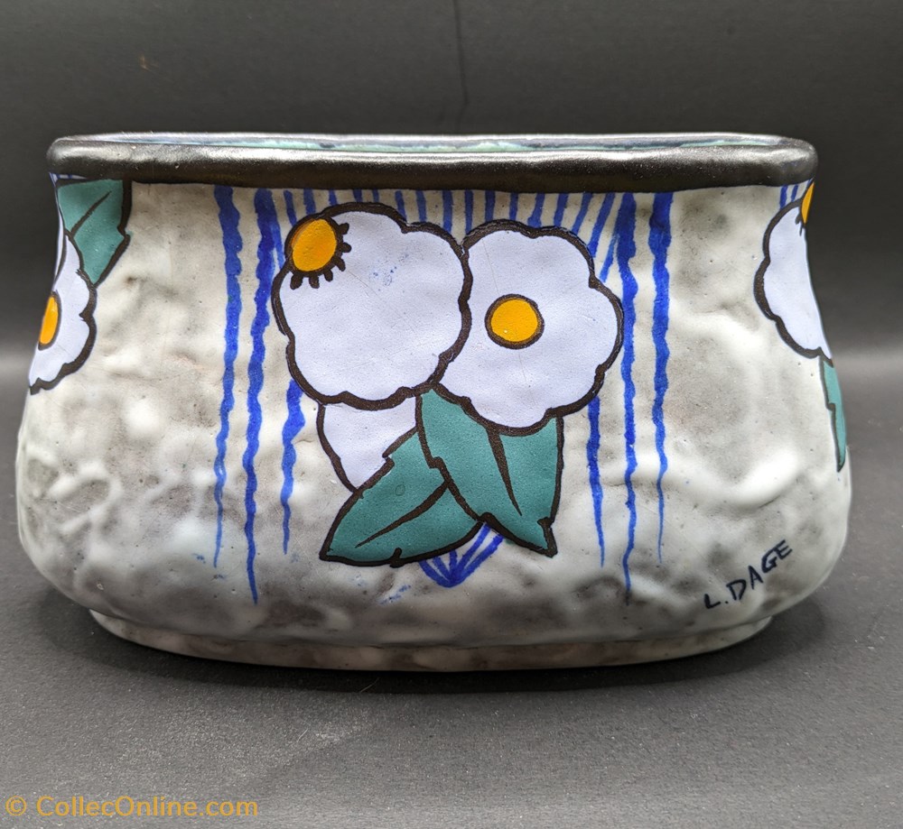 antiquites ceramique jardiniere dage art deco a decor de marguerites stylisees