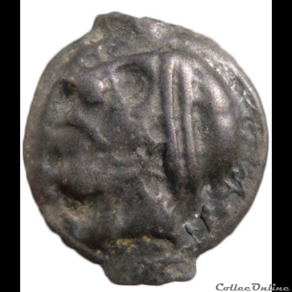 monnaie antique gauloise serie 854 dt potin au bandeau et a la tete negroide
