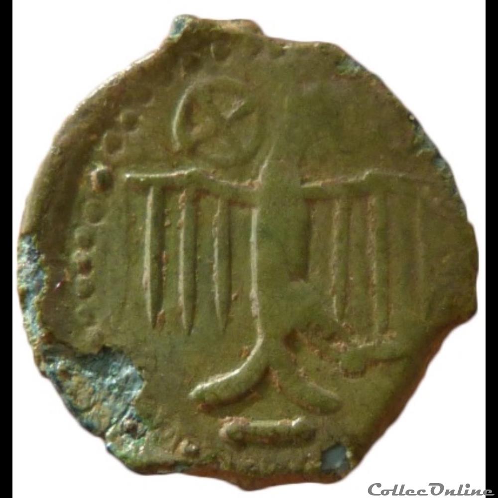 série 505 DT 2580 bronze à l'aigle et à la rouelle, tête à droite monnaie antique gauloise serie 505 dt 2580 bronze a aigle et a la rouelle tete a droite