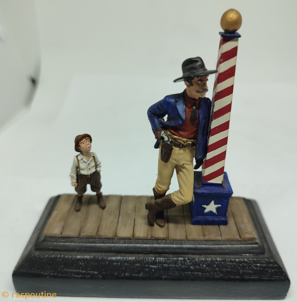 Cowboys et enfant dans la rue figurines cowboys et enfant dans la rue
