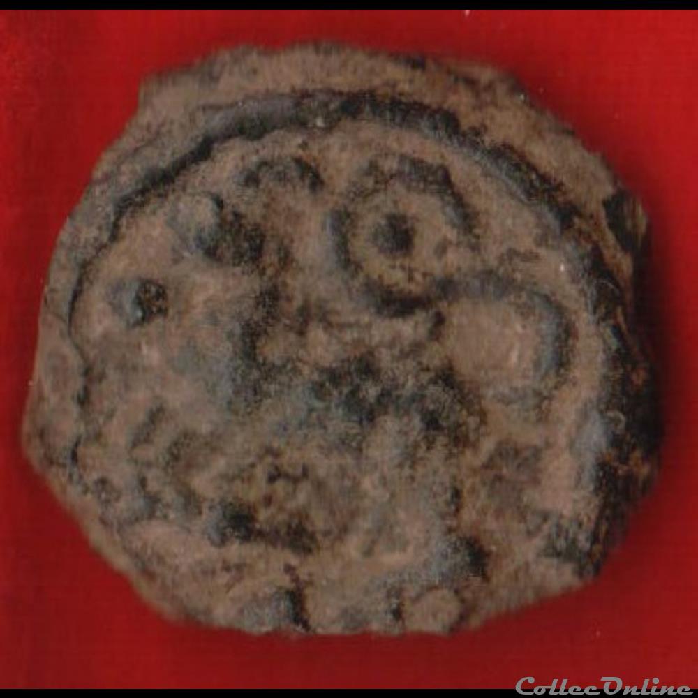 Sequanes - Potin à la tête chevelu au cheval avec annelet monnaies antiques celtes sequanes potin a la tete chevelu au cheval avec annelet
