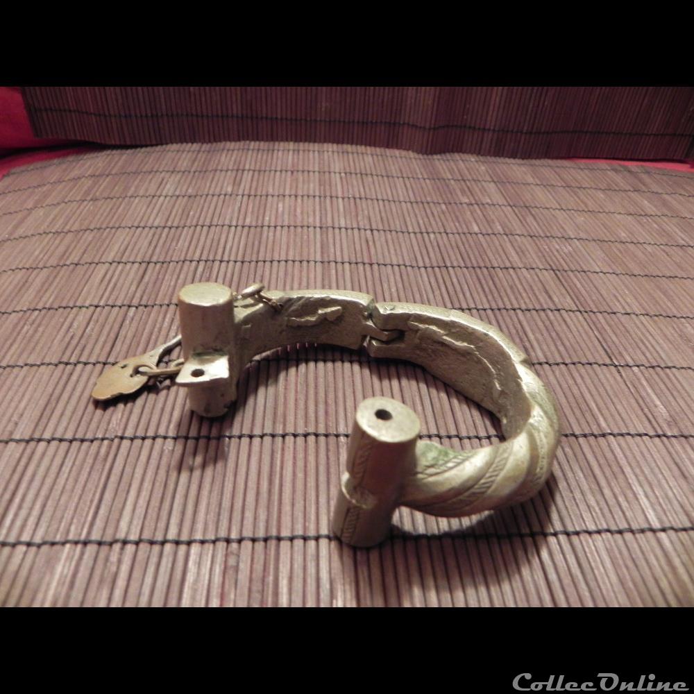 manille-monnaie à système ou articulée primitive afrique manille monnaie a systeme ou articulee