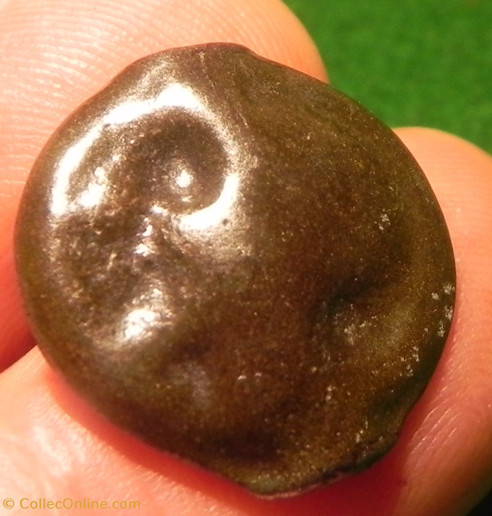 monnaies antiques celtes potin turons a la tete diabolique monnaie inspiration lunaire