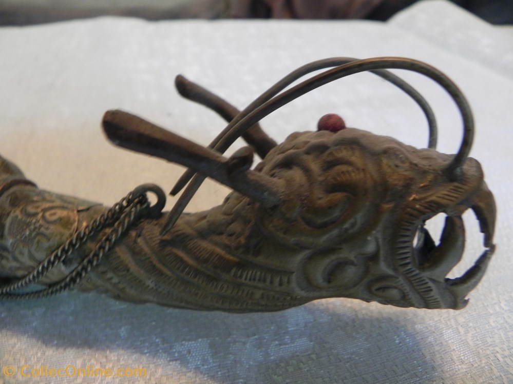 art antiquites oriental antique trompe tibetaine dragon instrument de rituel tibetain cuivre argente