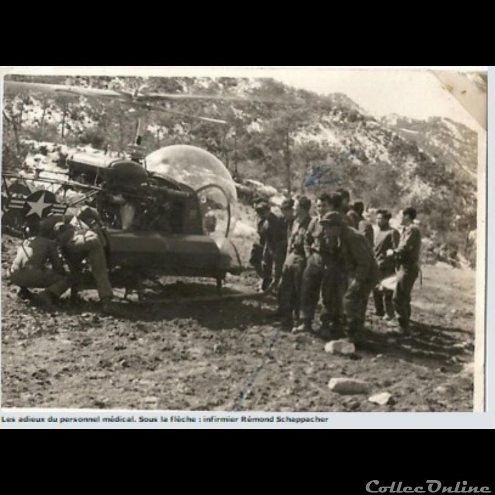 évacuation d'un blessé guerre de Corée 1952 photographie poid opium europe evacuation un blesse guerre de coree 1952