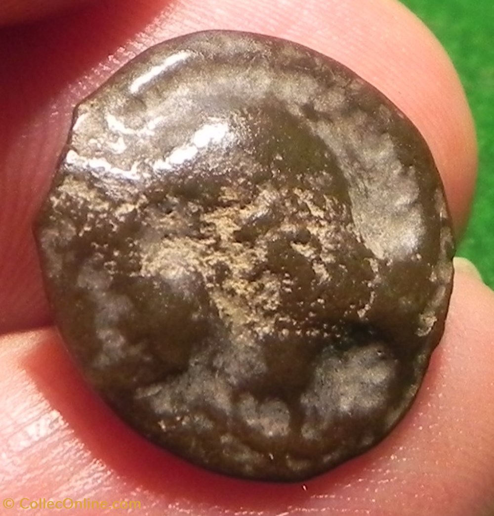 monnaies antiques celtes potin turons a la tete diabolique monnaie inspiration lunaire