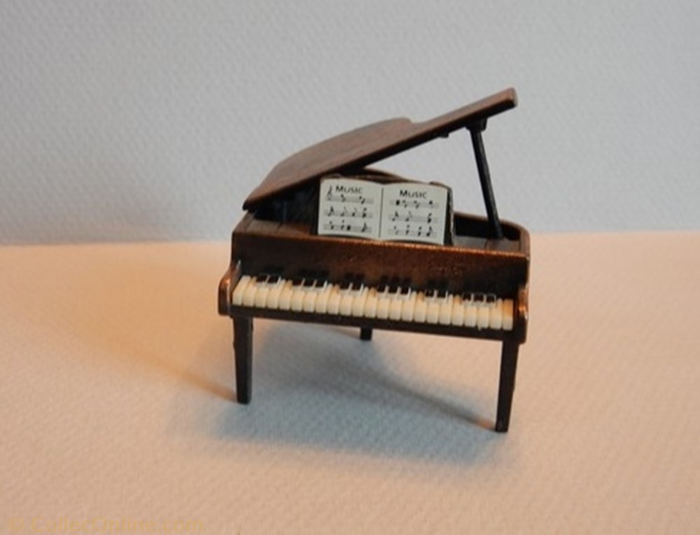 Piano à queue figurine autre piano a queue