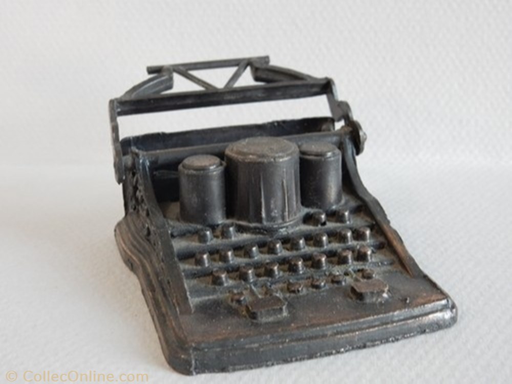 Machine a ecrire figurine autre machine a ecrire