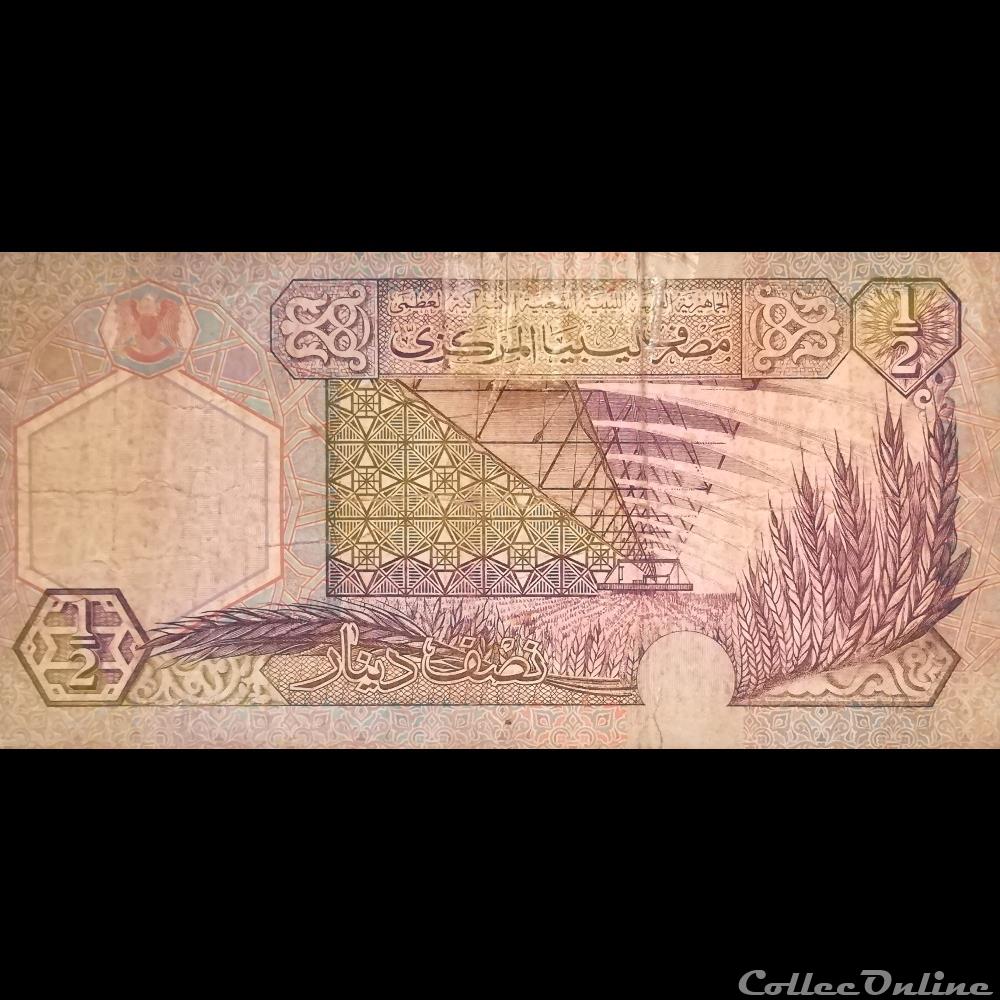 billet afrique libye p 63 1 2 dinar 2002