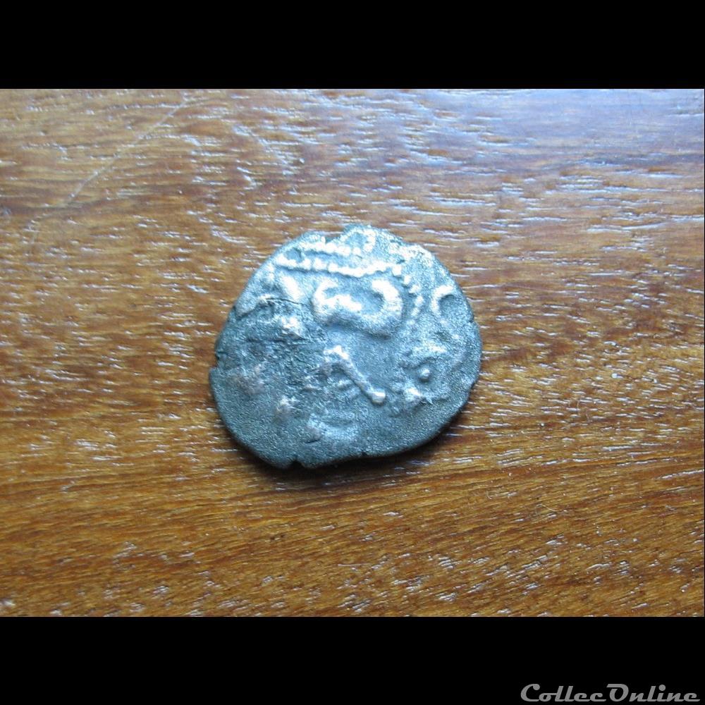 Quart de statère des Osismes, au personnage couché monnaie antique gauloise quart de statere des osismes au personnage couche