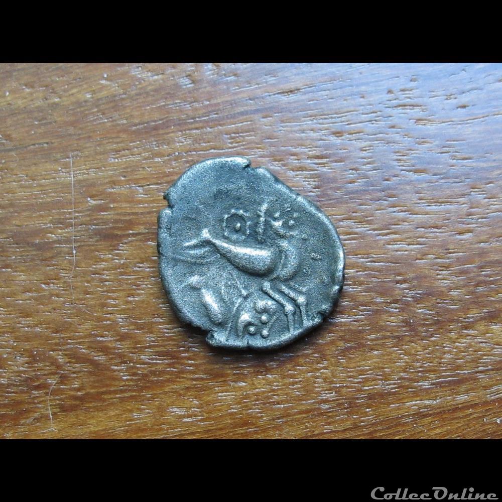 Quart de statère des Osismes, au personnage couché monnaie antique gauloise quart de statere des osismes au personnage couche