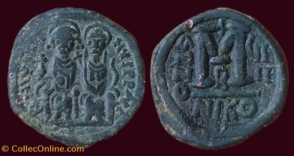 D N IVSTINVS P P AVG / A/N/N/O - GI/II B// NIKO monnaies byzantines l empire anastase maurice tibere d n ivstinvs p p avg a n n o gi ii b niko