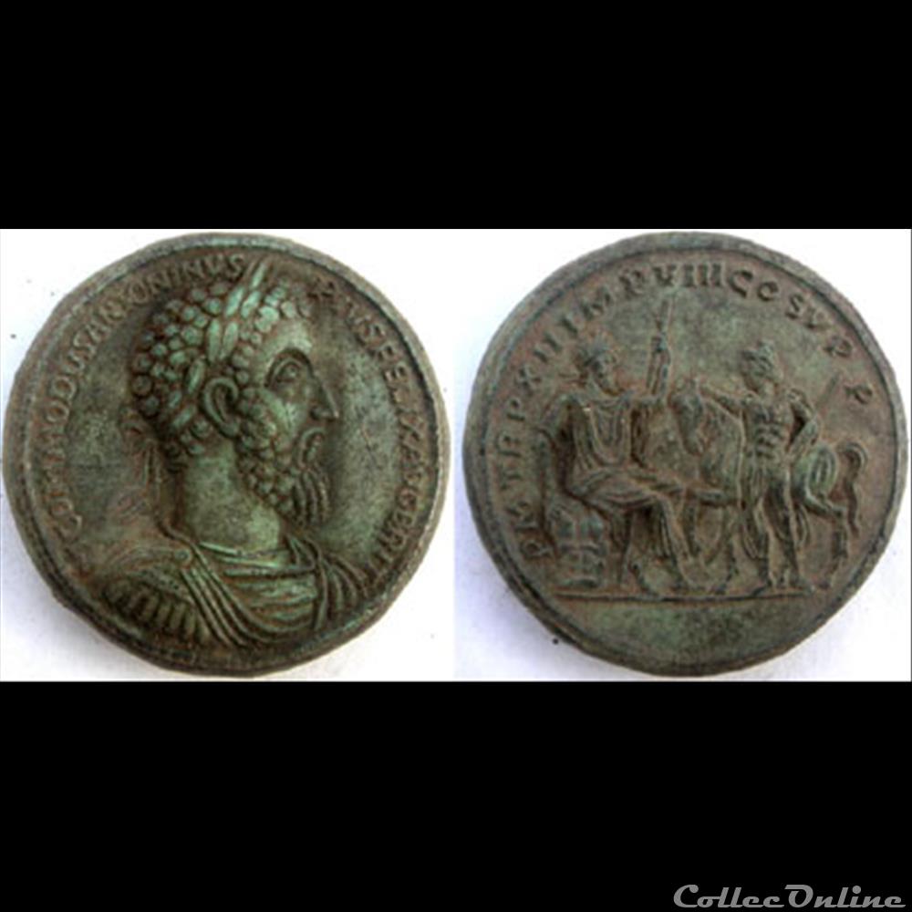 Sesterce COMMODE au revers PM TR P XII IMP VIII les Trois MONATAE 