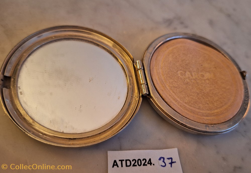 ATD2024.37 Poudrier rond argenté à pois Caron parfums beaute poudriers atd2024 37 poudrier rond argente a pois caron