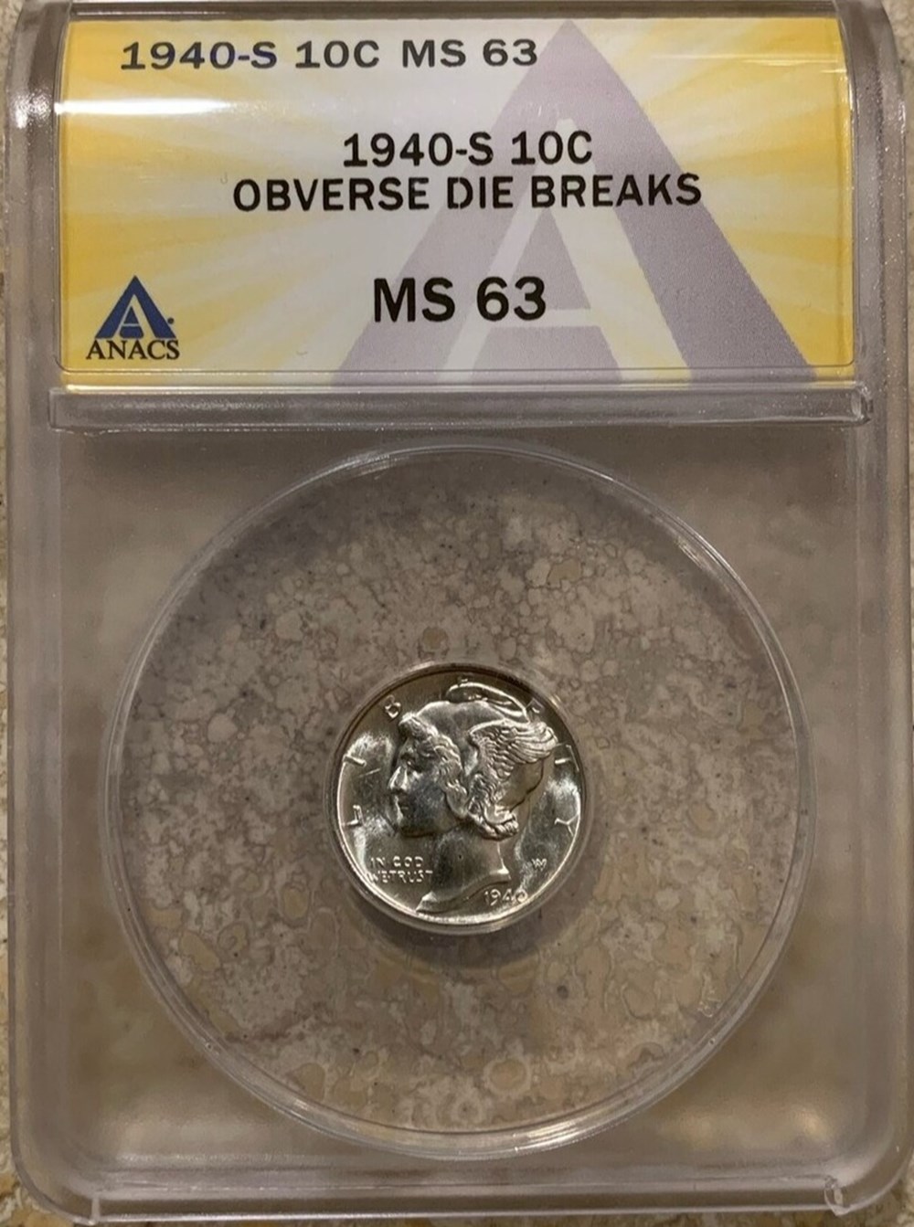 United States: 1940-S silver "Mercury" dime, obverse die breaks (ANACS MS63) 2 coins world united states 1940 s silver mercury dime obverse die breaks anacs ms63