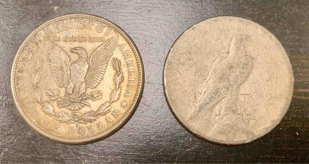 2 coins united states pair of silver dollars 1921 s morgan type and 1935 peace type