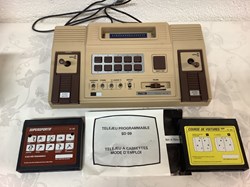 Console Pong jeu programmable complète dans sa boîte d’origine avec notice et 2 jeux ( course de voitures référence PC 504 et super sportif référence PC 501)