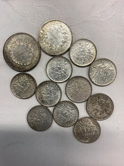 Lot de pièces en argent dont 1 pièce de 50 francs 1977, 1 pièce de 10 francs 1968 et 10 pièces de 5 francs années 1960 et autres