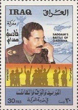 Saddam Hussein at the telephone, soldiers