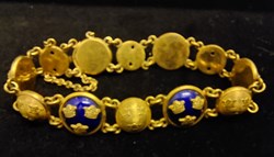 Armband lilla riksvapnet