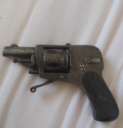 Pistola de bolso e de senhora antiga 1924