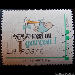 SP00023 Cigogne avec un garçon lettre verte 2015