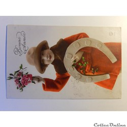 CPA de bonne année, fille avec fer à cheval.