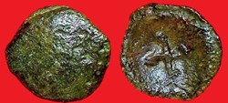 bronze à la tête de face et au swastika