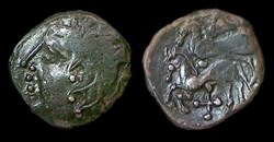 drachme aux deux chevaux et au triskèle tête à gauche .