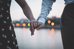 married-couple-holding-hands
