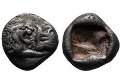 Royaume de Lydie / Douzieme de statère / Protomés de taureau et de lion affrontés.