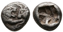 M-Royaume de Lydie / Vingt-quatrième de statère / Protomés de taureau et de lion affrontés.