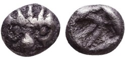 Asie Mineure-Incertaine-Obole-Face à tête de lion, coiffé d'une couronne radiée / Carré creux