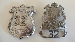 Badge métallique de  Police US-Norwalk-Connecticut.
