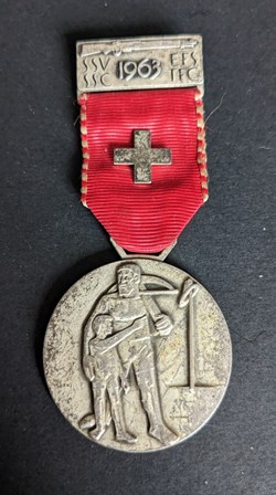 A- Médaille du prix de tir fédéral 1963