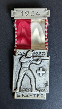 A- Médaille du prix de tir fédéral 1954