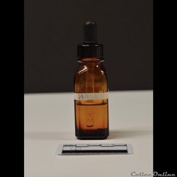 62 - Bouteille compte-goutte de Mélisol - avec son contenu