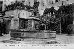 Salins les Bains (La fontaine du vigneron & la statue oeuvre de Max Claudet)