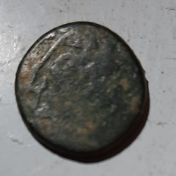 monnaie qui semble Islamique ? D14.4 P1.95 G Metal cuivre ou bronze