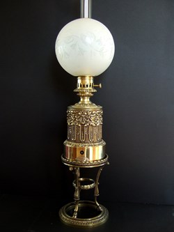 Lampe à huile à mouvement d'horlogerie