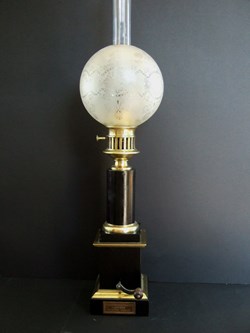 Lampe à huile à mouvement d'horlogerie " Gotten"