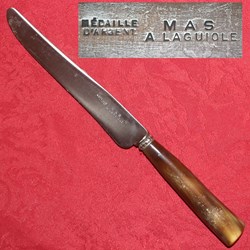 Fixe de table, Mas à Laguiole
